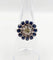 Bague 51.5 Art déco - Bague marguerite en or blanc 18k, diamant 0,65 ct et saphirs 58 Facettes A06329