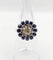 Bague 51.5 Art déco - Bague marguerite en or blanc 18k, diamant 0,65 ct et saphirs 58 Facettes A06329