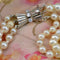 Collier Collier ancien triple rang de perles de culture en or blanc 18 carats 58 Facettes 22-188