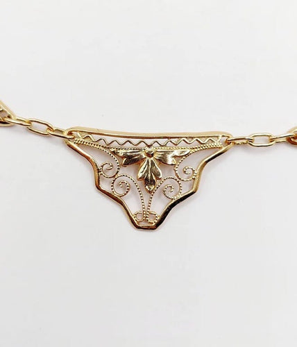 Collier Collier Art nouveau motifs filigranés en or jaune 18k, 40 cm 58 Facettes A06381