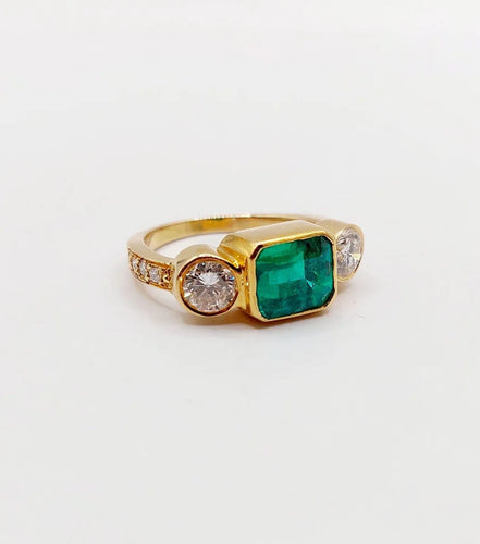 Bague 49 Bague jarretière vintage en or 18k avec émeraude et diamants 58 Facettes A06440