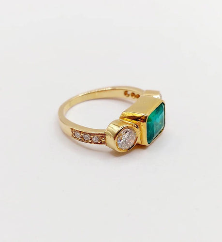 Bague 49 Bague jarretière vintage en or 18k avec émeraude et diamants 58 Facettes A06440