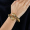 Bracelet Zolotas - Bracelet ouvrant ciselé en or jaune, saphirs et diamants 58 Facettes LP678/9