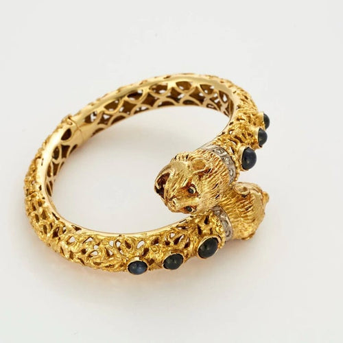 Bracelet Zolotas - Bracelet ouvrant ciselé en or jaune, saphirs et diamants 58 Facettes LP678/9