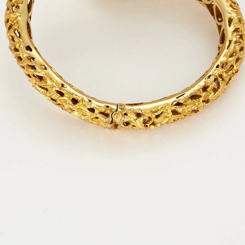 Bracelet Zolotas - Bracelet ouvrant ciselé en or jaune, saphirs et diamants 58 Facettes LP678/9
