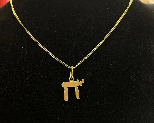Pendentif Pendentif Haï en or jaune 750/1000 58 Facettes LP235/3