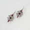 Boucles d'oreilles Boucles d’oreilles dormeuses en or blanc 750 avec diamants et rubis 58 Facettes LP782/16