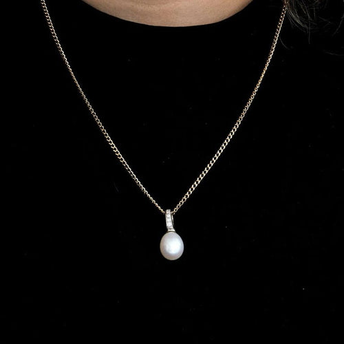 Pendentif Pendentif en or blanc 18 carats avec perle et diamants 58 Facettes LP1105/16