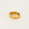 Bague 58 Ωζα - Bague jonc martelé en or jaune brun 750 sertie d’une spinelle rose 58 Facettes LP1182