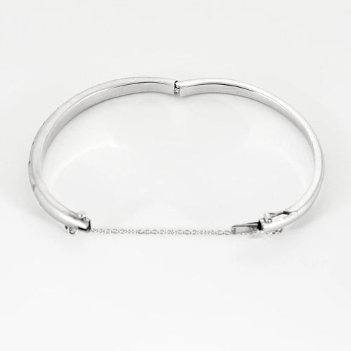 Bracelet Bracelet jonc en or blanc saphirs Teal et saphirs blancs 58 Facettes LP1222/14