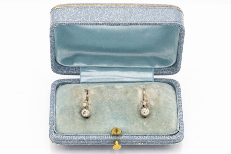 Boucles d'oreilles Boucles d'oreilles en or jaune et blanc avec diamants 58 Facettes 10190-4