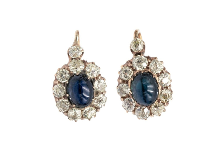 Boucles d'oreilles Boucles d’oreilles en or 14 carats avec diamants et saphirs cabochon 58 Facettes 10551