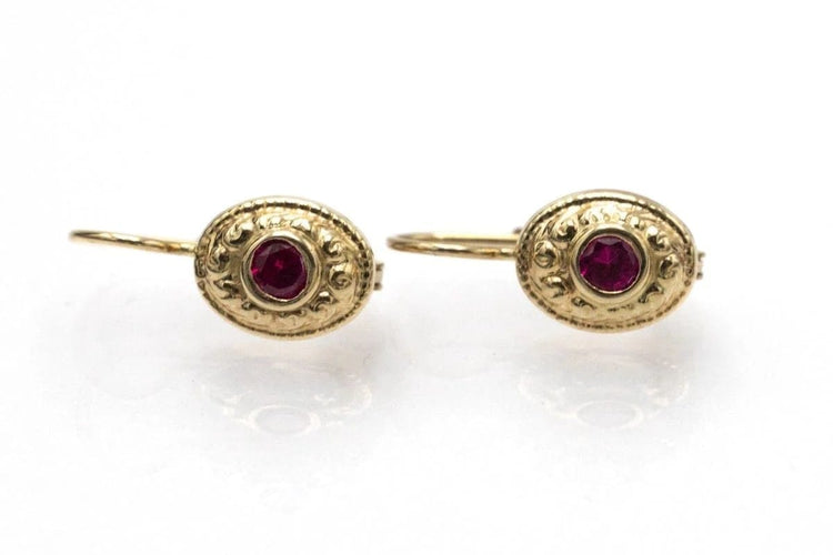 Boucles d'oreilles Boucles d'oreilles vintage en or jaune et rubis synthétiques 58 Facettes 10738