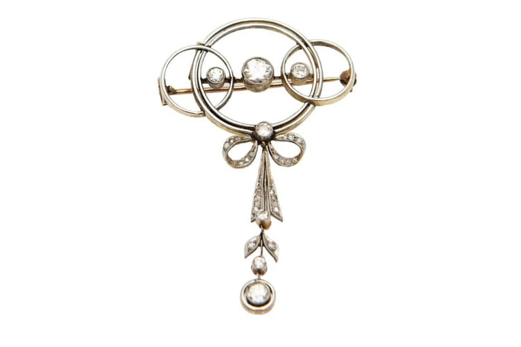 Broche Broche Art déco ancienne en or jaune et platine avec diamants 58 Facettes 9456