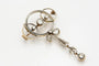 Broche Broche Art déco ancienne en or jaune et platine avec diamants 58 Facettes 9456