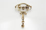 Broche Broche Art déco ancienne en or jaune et platine avec diamants 58 Facettes 9456