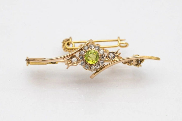 Broche Broche ancienne en or jaune avec olivine et diamants 58 Facettes 10280