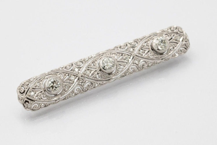 Broche Broche Art déco en or blanc et diamants 58 Facettes KLD2