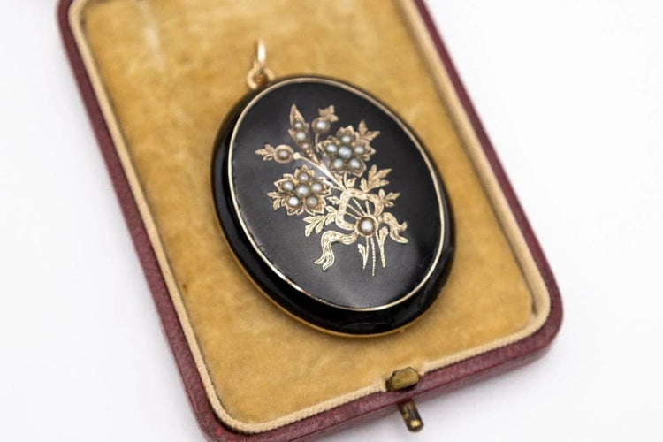 Pendentif Pendentif ancien médaillon en onyx, fin du XIXe siècle 58 Facettes 10566A