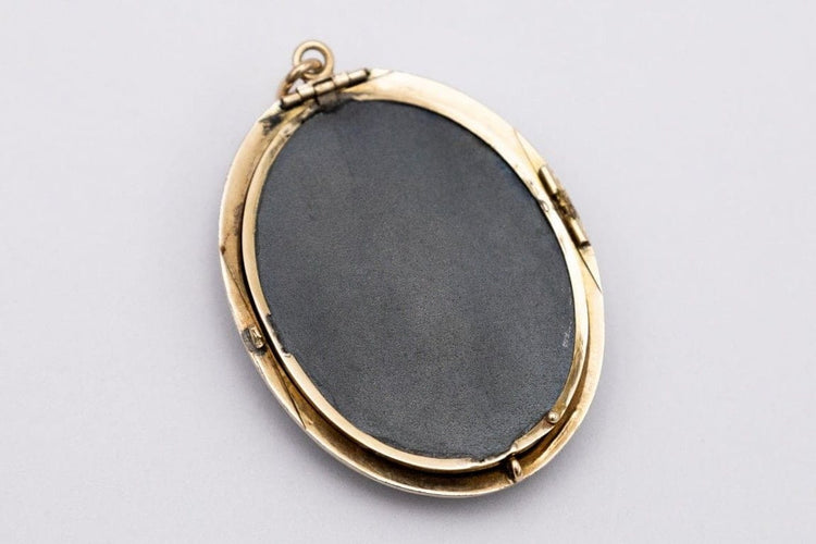 Pendentif Pendentif ancien médaillon en onyx, fin du XIXe siècle 58 Facettes 10566A