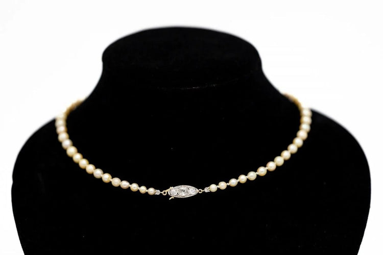 Collier Collier ancien en perles avec fermoir en or jaune, platine et diamants 58 Facettes 10271