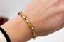 Bracelet Bracelet Art nouveau rigide en or jaune 14 carats, rubis et diamants 58 Facettes 10569