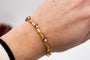 Bracelet Bracelet Art nouveau rigide en or jaune 14 carats, rubis et diamants 58 Facettes 10569