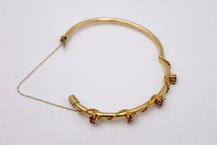 Bracelet Bracelet Art nouveau rigide en or jaune 14 carats, rubis et diamants 58 Facettes 10569