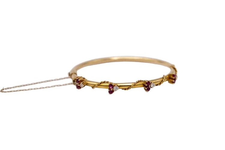 Bracelet Bracelet Art nouveau rigide en or jaune 14 carats, rubis et diamants 58 Facettes 10569