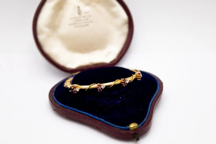 Bracelet Bracelet Art nouveau rigide en or jaune 14 carats, rubis et diamants 58 Facettes 10569
