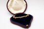 Bracelet Bracelet Art nouveau rigide en or jaune 14 carats, rubis et diamants 58 Facettes 10569