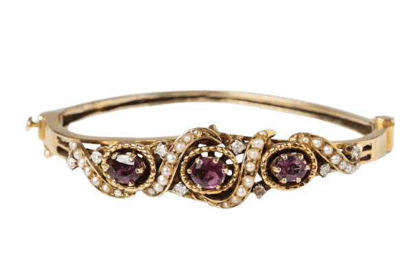 Bracelet Bracelet rigide ancien en or jaune 14 carats avec rubis, perles et diamants 58 Facettes 10673