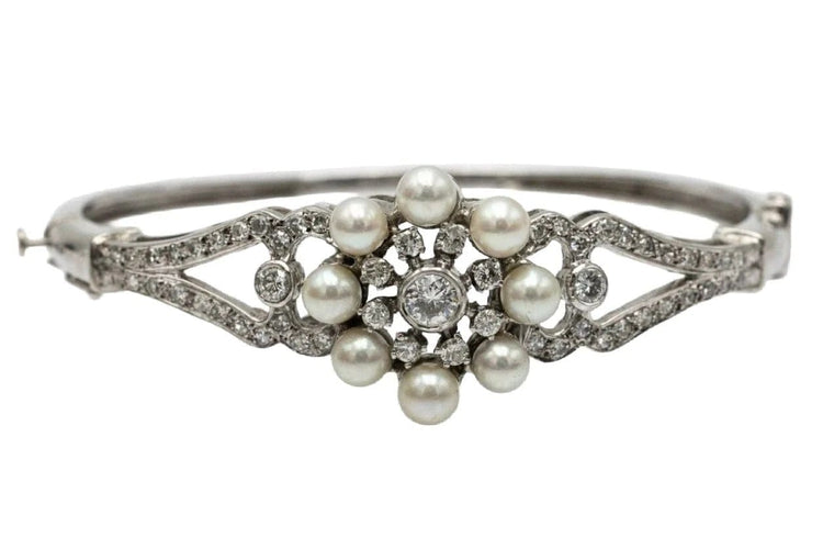 Bracelet Bracelet rigide en or blanc 14 carats avec diamants et perles 58 Facettes 10675