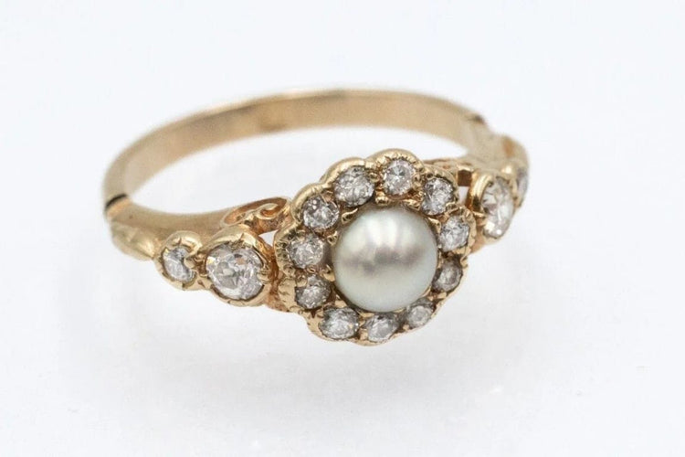 Bague 52 Bague marguerite en or jaune 14 carats, perle et diamants 58 Facettes 11481