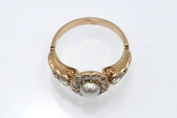 Bague 52 Bague marguerite en or jaune 14 carats, perle et diamants 58 Facettes 11481