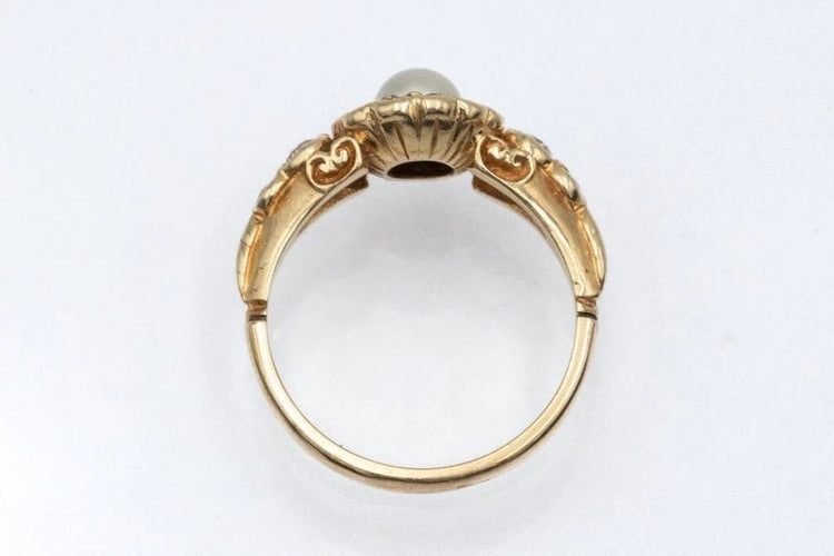 Bague 52 Bague marguerite en or jaune 14 carats, perle et diamants 58 Facettes 11481