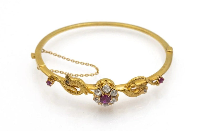 Bracelet Bracelet ancien motif phénix en or jaune 14 carats, rubis et diamants 58 Facettes 11397