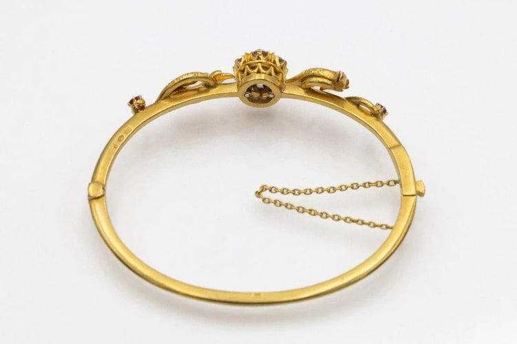 Bracelet Bracelet ancien motif phénix en or jaune 14 carats, rubis et diamants 58 Facettes 11397
