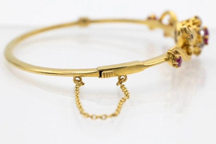 Bracelet Bracelet ancien motif phénix en or jaune 14 carats, rubis et diamants 58 Facettes 11397