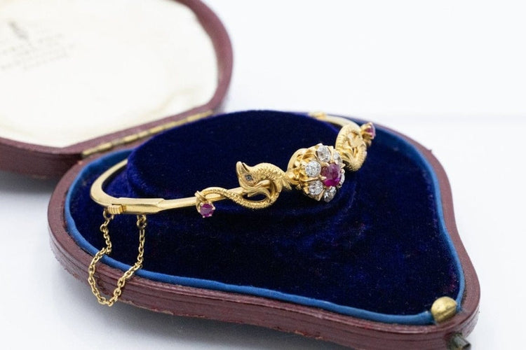 Bracelet Bracelet ancien motif phénix en or jaune 14 carats, rubis et diamants 58 Facettes 11397
