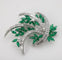 Broche Broche en or blanc 750 avec émeraudes et diamants 58 Facettes