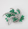 Broche Broche en or blanc 750 avec émeraudes et diamants 58 Facettes
