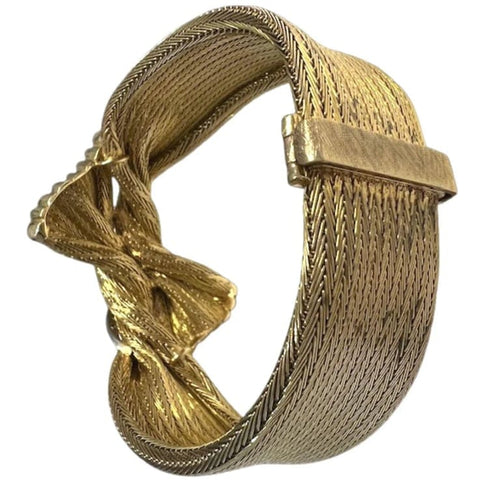 Bracelet Bracelet rétro années 1950 en or 18 carats et diamant 0,26 ct 58 Facettes A2627