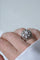 Bague 55 Bague cocktail - Bague fleur en or blanc et platine, diamants 58 Facettes