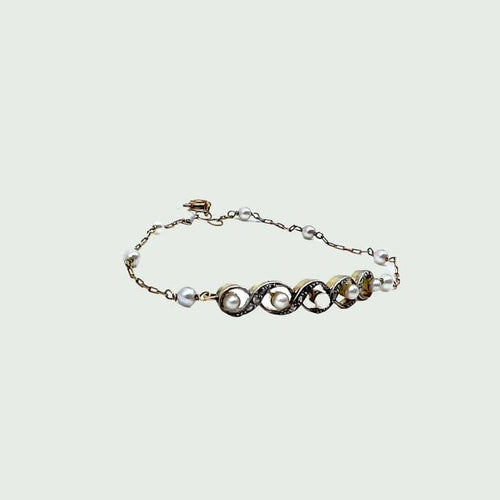Bracelet Bracelet Art déco en or 18 carats et platine avec diamants et perle 58 Facettes A2414(421)