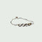 Bracelet Bracelet Art déco en or 18 carats et platine avec diamants et perle 58 Facettes A2414(421)