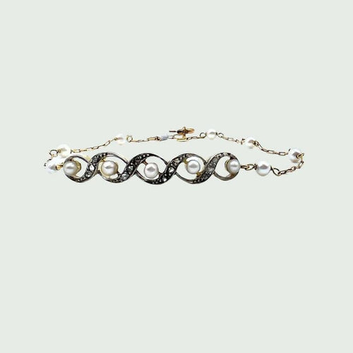 Bracelet Bracelet Art déco en or 18 carats et platine avec diamants et perle 58 Facettes A2414(421)