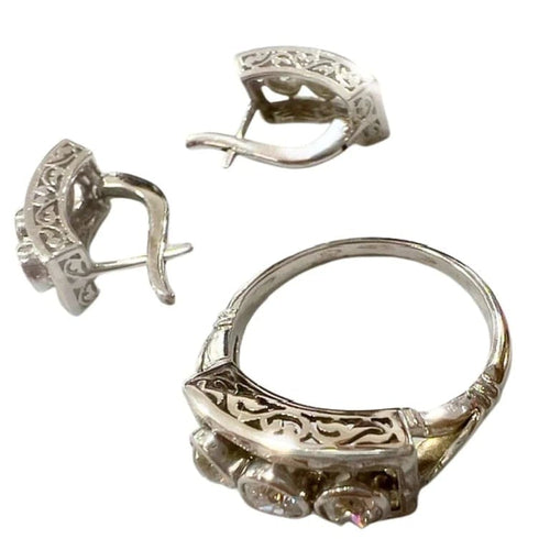 Bague 54 Ensemble bague et boucles d’oreilles en or jaune 18 ct et diamants 58 Facettes Q295B