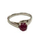 Bague 52.5 Bague solitaire en or blanc 18 kt avec rubis cabochon 58 Facettes Q332B