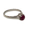 Bague 52.5 Bague solitaire en or blanc 18 kt avec rubis cabochon 58 Facettes Q332B